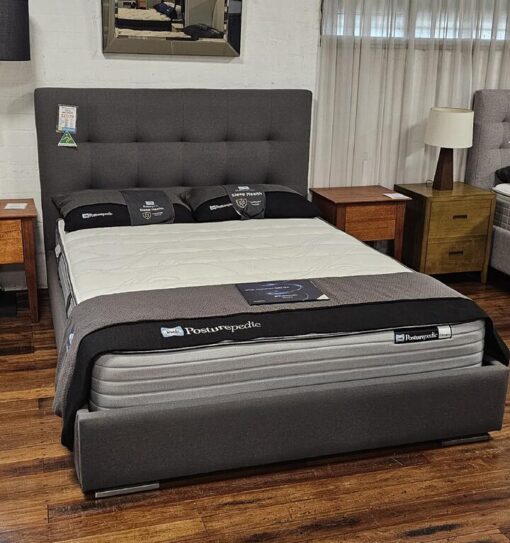 Leeds custom upholstered bed with deluxe base - discounted display model