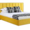 Panelled custom upholstered bed and wide headboard
