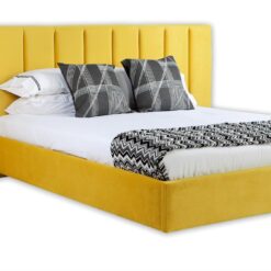 Panelled custom upholstered bed and wide headboard