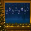 Brandy IP44 Indoor / Outdoor LED Curtain Light with Christmas Elements
